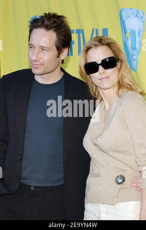 David Duchovny et sa femme Tea Leoni arrivent à la 11e fête annuelle 'BAFTA / LA Tea Party', qui s'est tenue à l'hôtel Park Hyatt de Los Angeles, le samedi 15 janvier 2005. Photo de Nicolas Khayat/ABACA. Banque D'Images