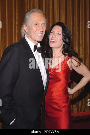 L'acteur américain David Carradine et Annie Berman assistent aux 57e prix annuels de la DGA au Beverly Hilton de Los Angeles, CA, USA, le 29 janvier 2005. Photo de Lionel Hahn/ABACA. Banque D'Images