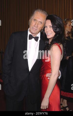 L'acteur américain David Carradine et Annie Berman assistent aux 57e prix annuels de la DGA au Beverly Hilton de Los Angeles, CA, USA, le 29 janvier 2005. Photo de Lionel Hahn/ABACA. Banque D'Images