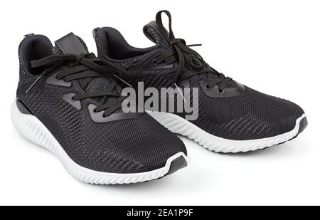 Paire de nouvelles chaussures de running, baskets ou baskets de sport noires sans marque isolées sur fond blanc avec passe-cheveux Banque D'Images