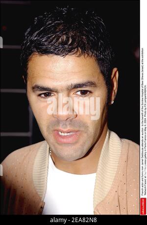 L'acteur français et drôle Jamel Debbouze assiste à une vente aux enchères au profit de l'hôpital Soroka de Beer Sheva (Israël) à l'exposition "Network faces" à la galerie Principessa à Paris-France le 9 mai 2004. Photo de François-Xavier Lamperti/ABACA. Banque D'Images