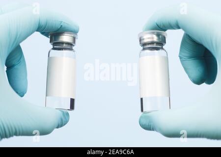 deux bocaux médicaux, mocap. sur fond bleu. espace de copie Banque D'Images