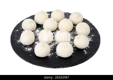 Boulettes congelées avec garniture pour la cuisson. Studio photo Banque D'Images