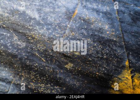 Arrière-plan de texture de pierre rouilleuse d'usure foncée. Corrosion de la surface par grunge Banque D'Images