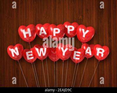 Ballons d'air rouges joyeux nouvel an en forme de coeur sur un arrière-plan en bois sombre Banque D'Images
