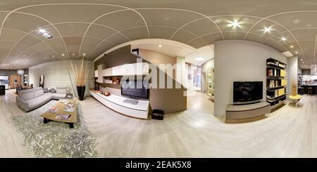Vue panoramique à 360° de panorama à 360 degrés d'un intérieur de salon haut de gamme avec décor beige, mobilier moderne et effets personnels