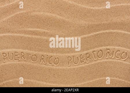 Inscription de Porto Rico sur le sable ondulé Banque D'Images