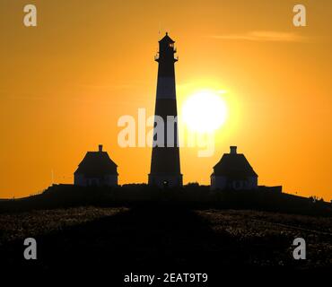 Leuchtturm, Westerheven Sonnenuntergang Banque D'Images