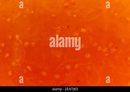 détail d'une confiture de mandarine (nuance rouge-orange) Banque D'Images