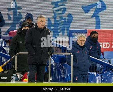 Liverpool. 11 février 2021. Jose Mourinho (2e R), le directeur de Tottenham Hotspur, et Carlo Ancelotti (L, Front), le directeur d'Everton, sont vus lors du 5e match de la coupe FA entre Everton FC et Tottenham Hotspur FC à Goodison Park à Liverpool, en Grande-Bretagne, le 10 février 2021. Credit: Xinhua/Alay Live News Banque D'Images