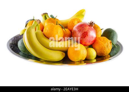 Assortiment de fruits frais et de légumes de bananes, grenade, citron, mandarine et avocat. Banque D'Images