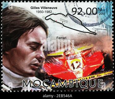 Gilles Villeneuve et sa Ferrari sur timbre-poste Banque D'Images