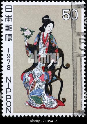 Illustration d'une geisha sur un timbre-poste japonais Banque D'Images