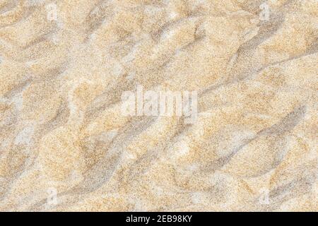 Texture sable pour l'été. Plage de sable pour l'arrière-plan. Motif sable naturel. Vue de dessus. Banque D'Images