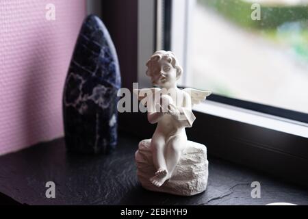 Ange protecteur dans la chambre de la fille. Banque D'Images