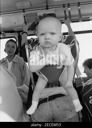 Bébé dans le bus, Brooklyn, New York.City Banque D'Images