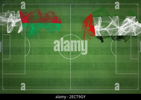 Match de football de Madagascar contre les Émirats arabes Unis, couleurs nationales, drapeaux nationaux, terrain de football, jeu de football, concept de compétition, espace de copie Banque D'Images