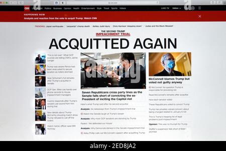 Capture d'écran du site Web de CNN indiquant que l'ancien président Donald Trump a été acquitté par le Sénat américain lors de son deuxième procès pour destitution. Banque D'Images