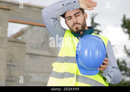 constructeur ou constructeur souffrant de la douleur de scruff Banque D'Images