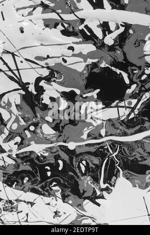 Peintures à base d'huile et d'eau immiscibles qui ne se mélangent pas Ensemble utilisé dans une peinture de style Jackson Pollock pour présenter interaction et répulsion Banque D'Images