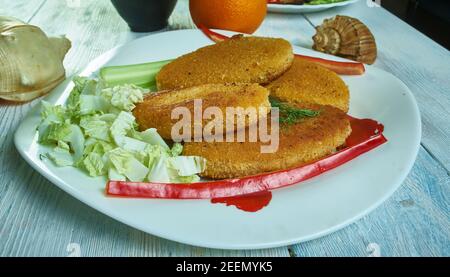 Gâteaux de poisson de Durban, vérifier les prix de la morue et du saumon Banque D'Images