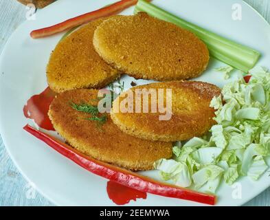 Gâteaux de poisson de Durban, vérifier les prix de la morue et du saumon Banque D'Images