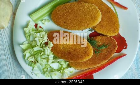 Gâteaux de poisson de Durban, vérifier les prix de la morue et du saumon Banque D'Images