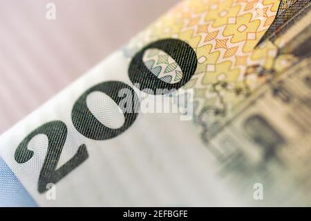 Un billet de banque de deux cents, gros plan extrême Banque D'Images
