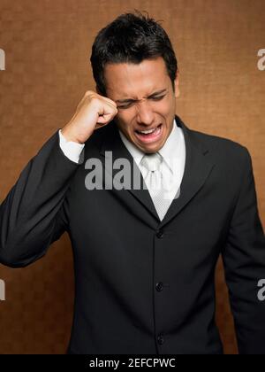 Gros plan d'un homme d'affaires qui pleure Banque D'Images