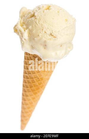 Un cône de crème glacée avec une cuillère de crème glacée Banque D'Images