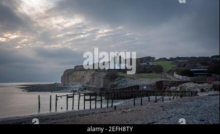 Les vieilles cottages Coastguard à Cuckmere Haven, East Sussex, Royaume-Uni Banque D'Images