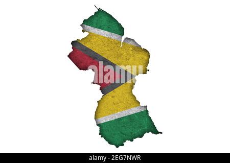 Carte et drapeau du Guyana sur le béton abîmé Banque D'Images