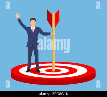 atteindre l'objectif, homme d'affaires avec un dart dans sa main ...