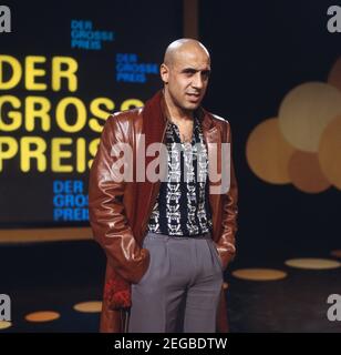 DER GROSSE PREIS, ZDF Quiz Sendung, 1980, Gaststar: Adriano Celentano, italiener Sänger und Sauspieler. DER GROSSE PREIS, programme ZDF Quiz, 1980, star invitée Adriano Celentano, chanteur et acteur italien. Banque D'Images