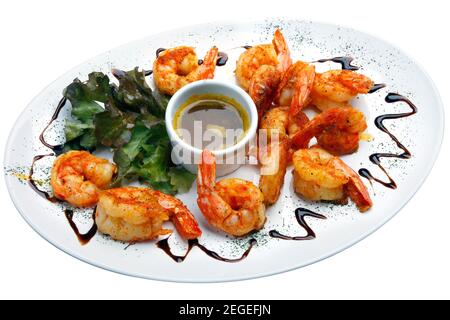 Haute cuisine, grandes crevettes avec sauce Banque D'Images