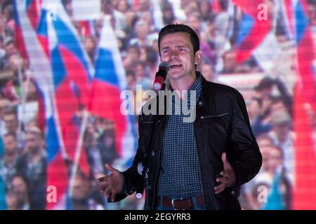 Moscou, Russie. Le 20 septembre 2015, Ilya Yashin, activiste et politicien libéral, s'est adressé aux militants de l'opposition russe alors qu'ils se sont ralliés dans le district de Maryino à Moscou.le 20 septembre 2015, à la suite d'élections régionales qui ont largement favorisé le parti Russie unie au pouvoir et qui ont suscité des accusations de trucage de votes. La manifestation Meeting to change Power, organisée par l'éminent militant anti-corruption Alexei Navalny, a attiré environ 2,000 à 4,000 personnes, bien en deçà des estimations avant le rassemblement Banque D'Images