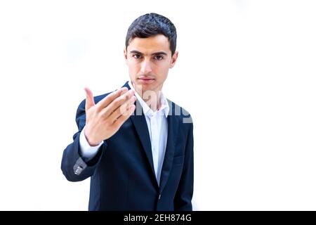 Jeune arabe qui porte son costume et pose Banque D'Images