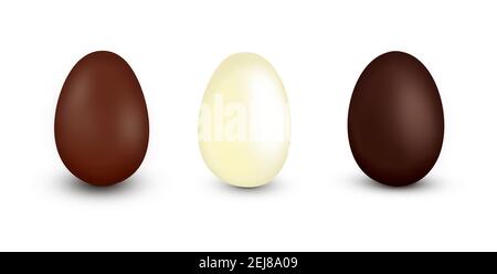 Trois œufs de chocolat de Pâques réalistes isolés sur blanc. Banque D'Images