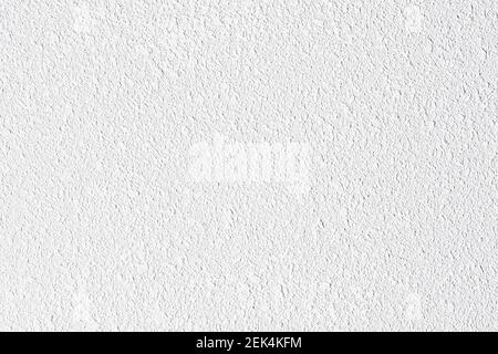 Arrière-plan de la structure de peinture blanc grené et granuleux. Texture gris clair grundy. Motif urbain robuste pour un effet abstrait frais. Surface de grunge granulaire. Banque D'Images