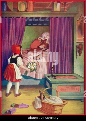 Une illustration britannique des couleurs des enfants vers les années 1940 CAGOULE ROUGE de conte de fées avec la fille en face par le carcajou qui avait mangé sa grand-mère Banque D'Images