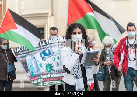 Rome, Italie. 26 février 2021. Rome Vendredi 26 février: piazza S. Silvestro vaccins sit-in POUR LA PALESTINE - débloquer les vaccins pour la population active. Vacciner les prisonniers politiques dans les prisons israéliennes. Proumove la Communauté palestinienne de Rome et du Latium. Crédit : Agence photo indépendante/Alamy Live News Banque D'Images