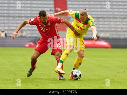 Munich, Allemagne. 27 février 2021. Eric MAXIM CHOUPO-MOTING (FCB 13) concurrence pour le ballon, lutte, duel, tête, zweikampf, Action, lutte contre Marius WOLF, 1.FCK 31 dans le match FC BAYERN MUENCHEN - 1.FC KOELN 5-1 1.Ligue allemande de football le 27 février 2021 à Munich, Allemagne saison 2020/2021, match jour 23, 1.Bundesliga, FCB, München, 23.Spieltag, Köln. © Peter Schatz / Alamy Live News - LE RÈGLEMENT DFL INTERDIT TOUTE UTILISATION DE PHOTOGRAPHIES comme SÉQUENCES D'IMAGES et/ou QUASI-VIDÉO - Banque D'Images