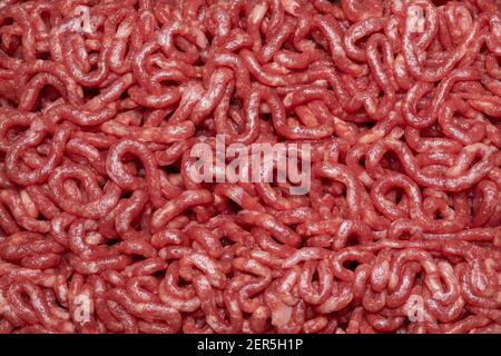 Vue de dessus photo macro plein format de viande fraîche hachée. Banque D'Images