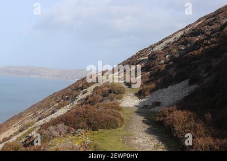 Ces piliers en pierre sont l'entrée de la promenade du Jubilé Le chemin côtier de Panmaenmawr à Conwy Banque D'Images