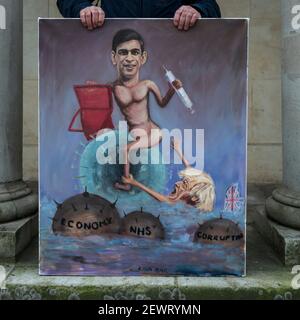 Londres, Royaume-Uni. 3 mars 2021. Kaya Mar, artiste satirique, pose avec ses dernières œuvres d'art à Whitehall. La pièce montre le chancelier de l'Échiquier et le premier ministre. Rishi Sunak, chancelier de l’Échiquier, prononcera plus tard son discours sur le budget à la Chambre des communes. Credit: Stephen Chung / Alamy Live News Banque D'Images