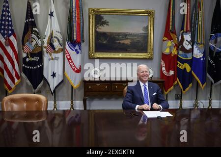 Washington, États-Unis. 04e mars 2021. Le président Joe Biden sourit lors d'un appel virtuel pour féliciter l'équipe de persévérance JPL de la NASA pour le succès de l'atterrissage de Mars dans la salle Roosevelt de la Maison Blanche, le jeudi 4 mars 2021 à Washington, DC. (Photo d'Oliver Contreras pour Pool/Sipa USA) Credit: SIPA USA/Alay Live News Banque D'Images