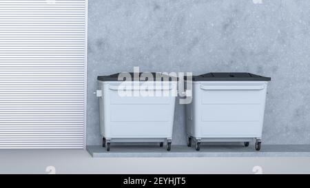 Vue avant de deux conteneurs à déchets de recyclage à 4 roues à côté le chantier de construction Banque D'Images