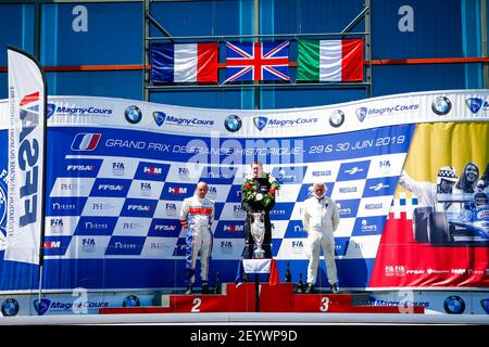 38 d'AUBREBY Patrick (fr), 761 - 3000 mars 34 FLETCHER Henry (gb), 761 - 3000 mars 61 WRIGHT Jason (IT), Shadow DN8 - 3000, ambiance podium au Grand Prix de France Historique 2019 à Magny-cours du 29 au 30 juillet - photo Julien Delfosse / DPPI Banque D'Images