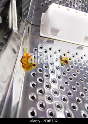 La rouille sur le tambour de la nouvelle machine à laver Banque D'Images