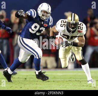 New Orleans Saints quarter back Drew Brees hugs running back Reggie Bush as  the Saints defeat the Indianapolis Colts in Super Bowl XLIV at Sun Life  Stadium in Miami on February 7